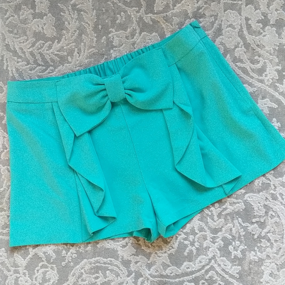 Turquoise shorts with bow & ruffle detail